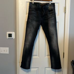 American Eagle jeans. Washed black Distressd. Extreme flex. Slim fit. Size 34x32